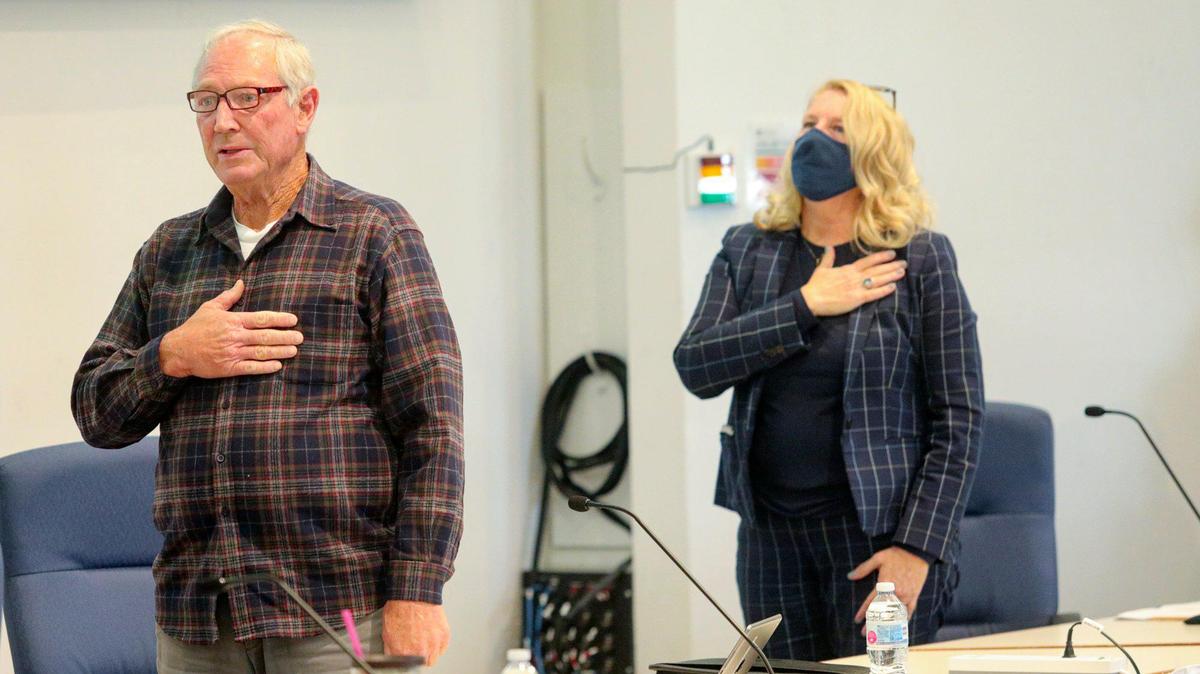 Cuesta College Trustee Pete Sysak and Dr. Jill Stearns, superintendent/president, recite the Pledge of Allegiance at a special board meeting in 2020. Public comment was held on Sysak’s social media posts and many called for his resignation.