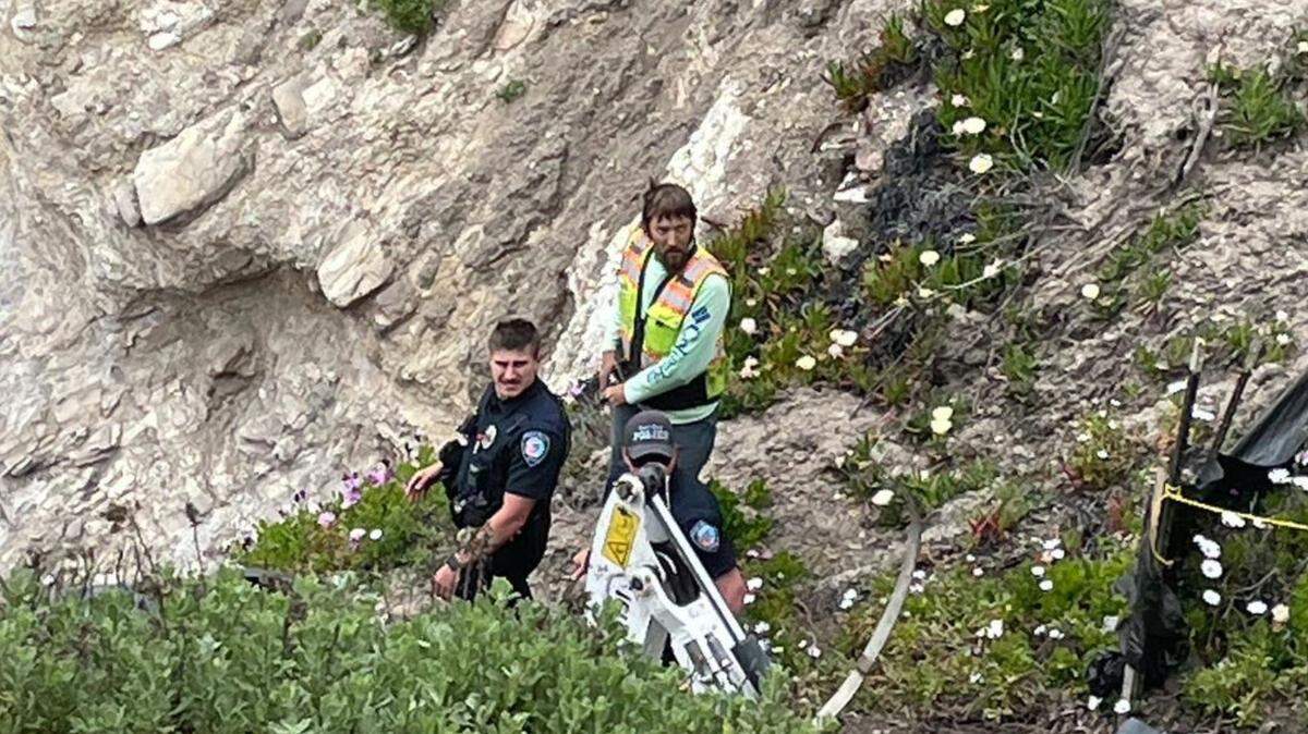 Pismo Beach Police Department officers respond to a cliff rescue near Dolphin Bay Resort & Spa in Shell Beach.