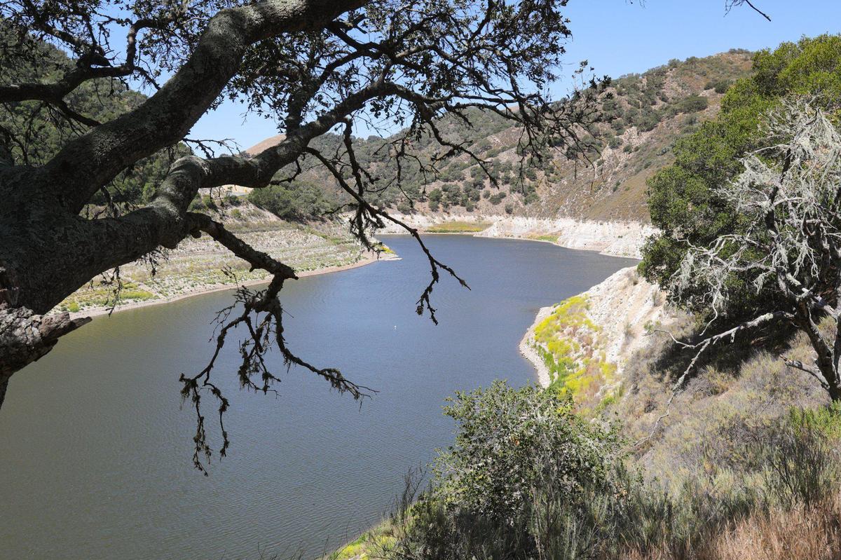 A layer of limestone rock is seen in the hills surrounding Lopez Lake near Arroyo Grande due to low lake levels caused by drought. Many south San Luis Obispo County towns rely on the reservoir for most or all of their water; lake levels were at 28.4% on May 13, 2022.