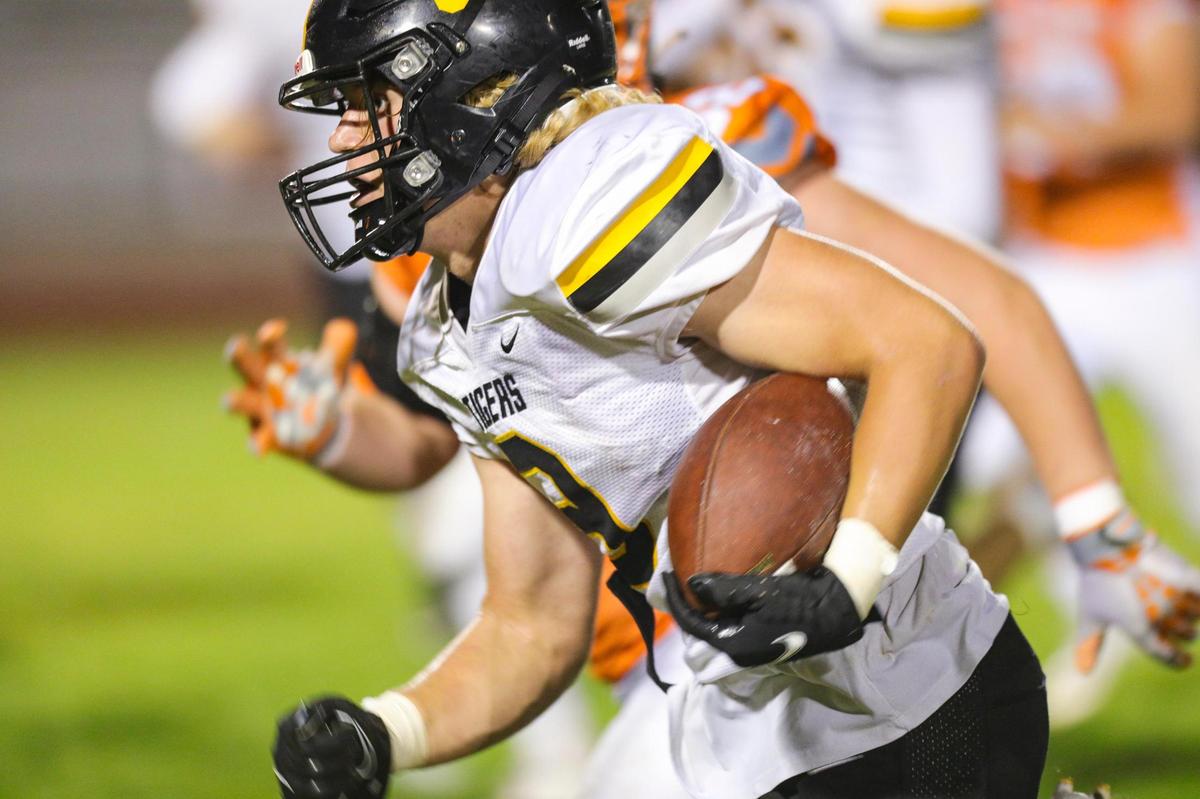 Gavin Righetti runs back an interception for a touchdown in San Luis Obispo’s 31-13 win over Atascadero on Oct. 22, 2021.