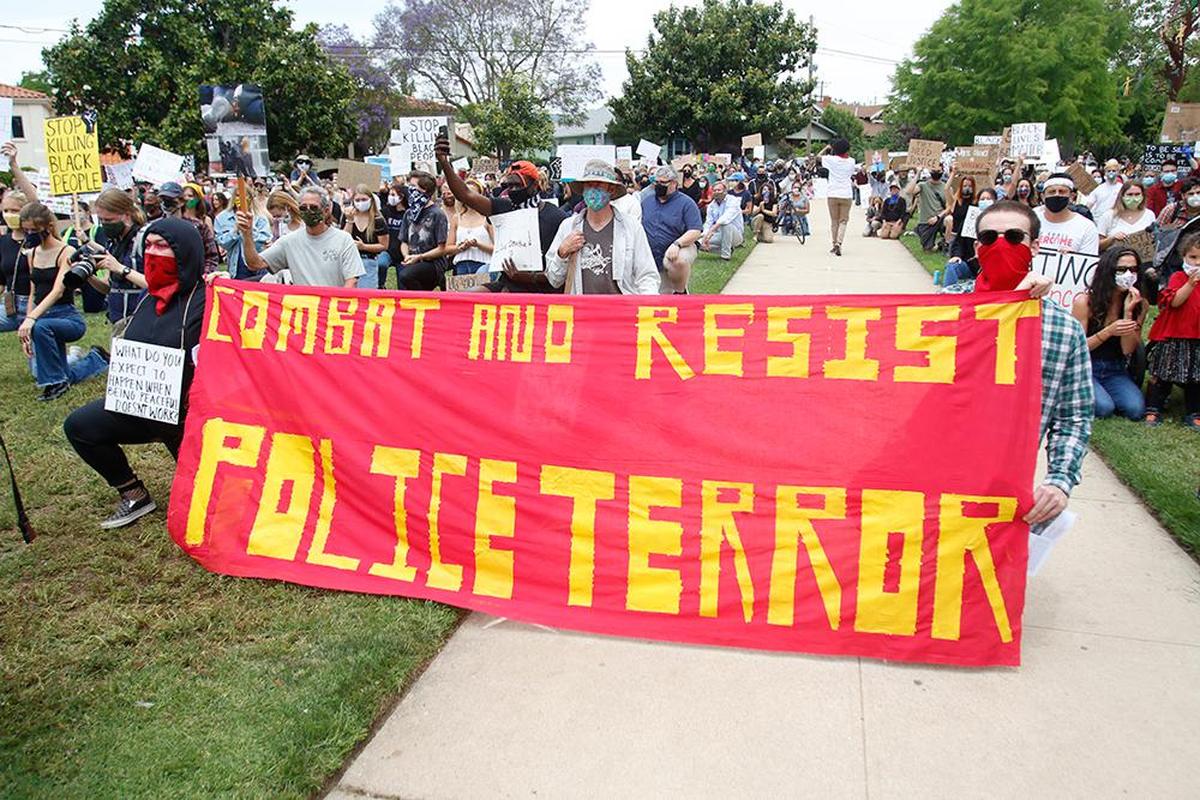 RACE Matters SLO County held a rally in San Luis Obispo to protest violence against people of color in America. The protest comes as numerous others pop up around the country in response to the death of black man, George Floyd, while in police custody in Minneapolis.