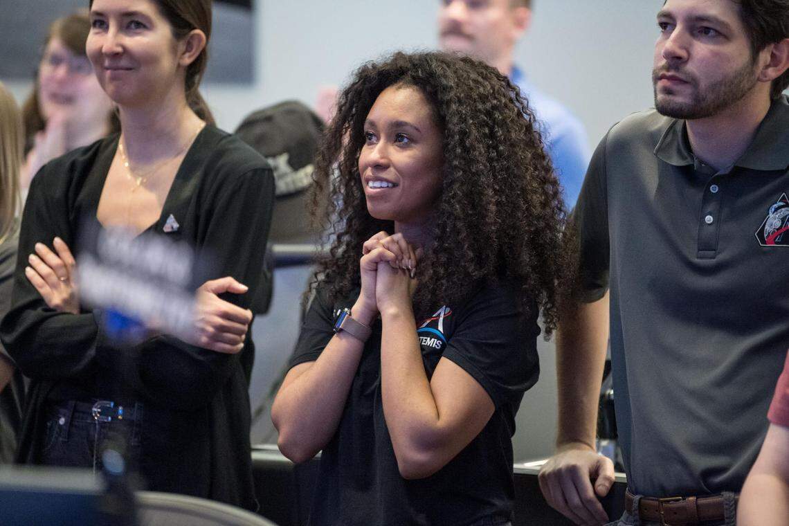 Members of the Artemis lunar science team, from left, Ariel Deutsch, Amber Turner, and Wilfredo Garcia-Lopez, watch the Artemis II launch from the Science Evaluation Room (SER) in Mission Control at Johnson Space Center in Houston on April 1, 2026.