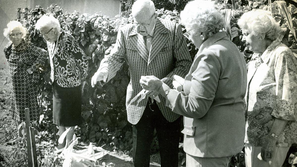 Members of the Phoenix family share a quiet moment in the garden of what remains of their early 20th century family homestead in 1975. From the left are Georgia Conrad, Margaret Harloe, Harry Phoenix, Dorothy Phelan and Bernice Canning.