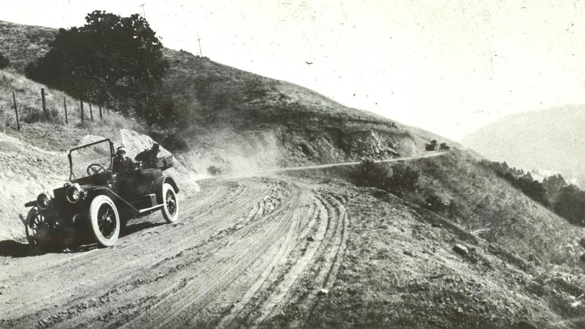 OLD CUESTA ROAD–A photo from the California Division of Highways [now Caltrans] which once reported 71 hazardous curves on the highway north of San Luis Obispo. The dirt road was built to replace Stage Coach Road in 1915 and improved in 1923, the photo is from about 1922.
