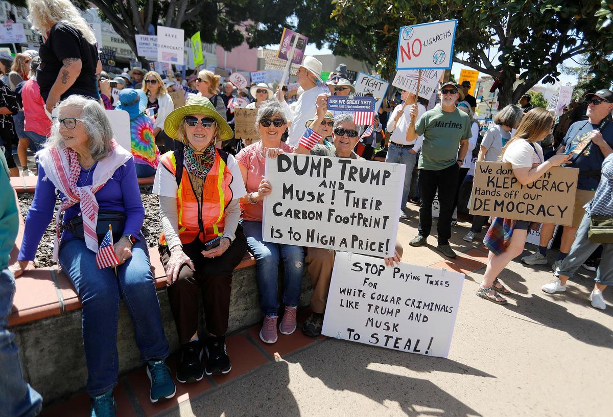 Thousands of people gather at San Luis Obispo Superior Court in California as part of the “Hands Off!” rally to protest President Donald Trump and his advisor Elon Musk.