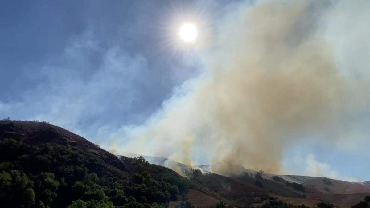 Smoke from a wildfire burning near Highway 46, Friday, Oct. 6, 2023.