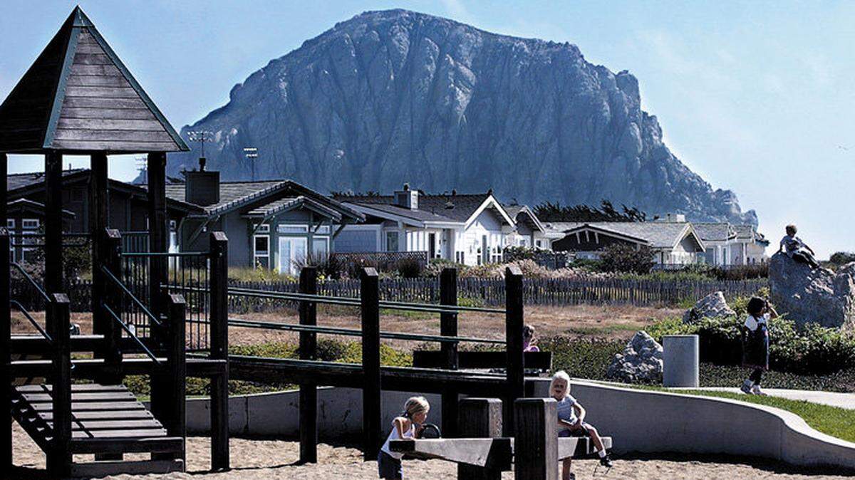 Children play on the seesaw at the playground at Cloisters Park in Morro Bay in 2004. About 10,000 gallons of sewage spilled in the area, the San Luis Obispo County Public Health Department says.