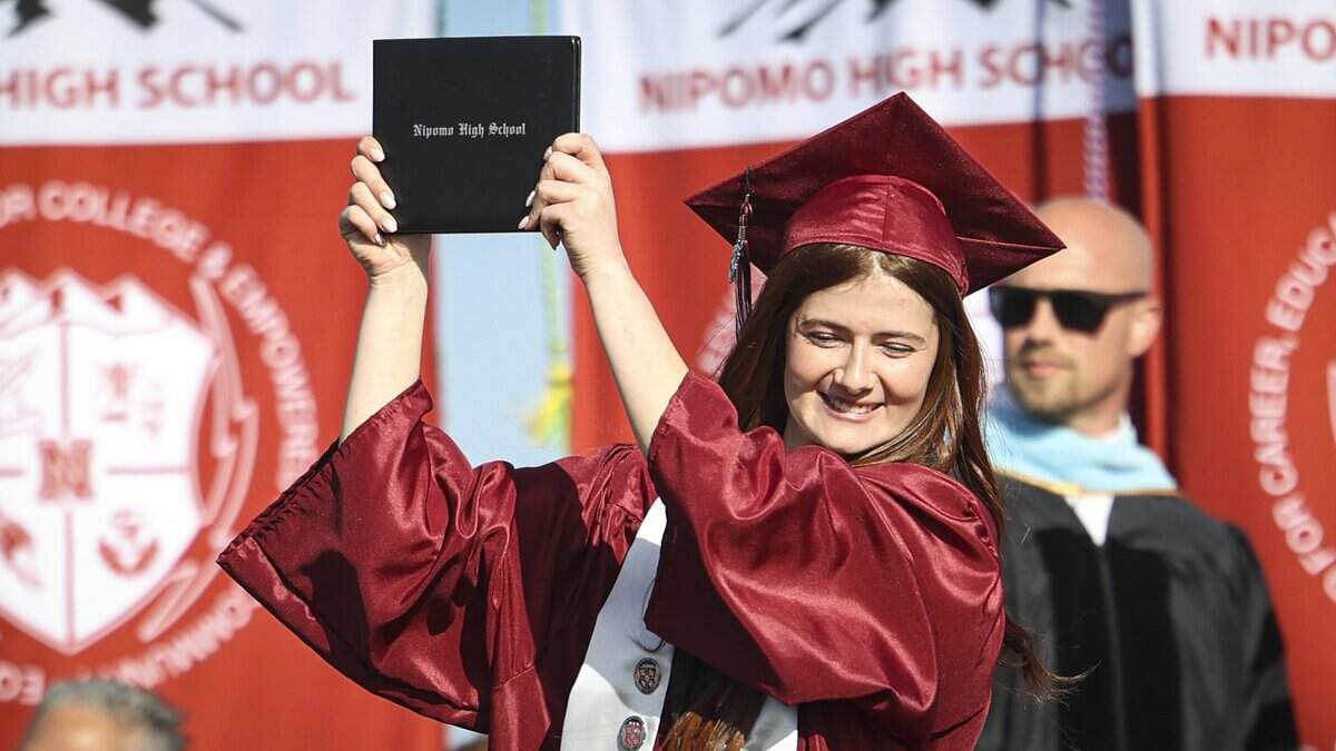 Lucero Contreras holds up diploma. Nipomo High School issued diplomas to 198 graduates on June 5, 2026.