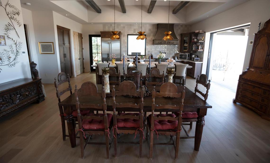 The dining room blends seamlessly with the kitchen area of the San Miguel home of Charles Miller and Tina Gulotta-Miller.