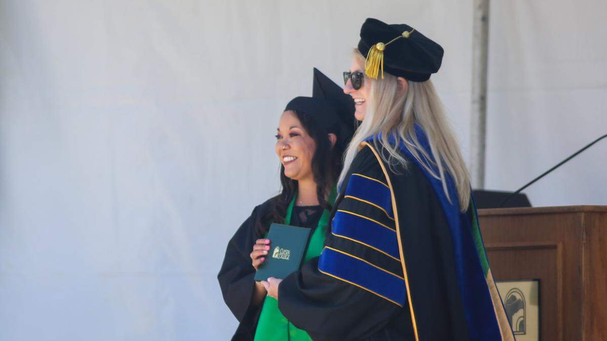 Cuesta College president Jill Stearns hands a student her diploma at the 61st Commencement Ceremony on Friday, May 22, 2026. More than 1,500 walked the stage on Friday.