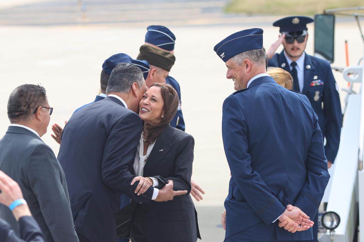 U.S. Senator Alex Padilla hugs Vice President Kamala Harris.
