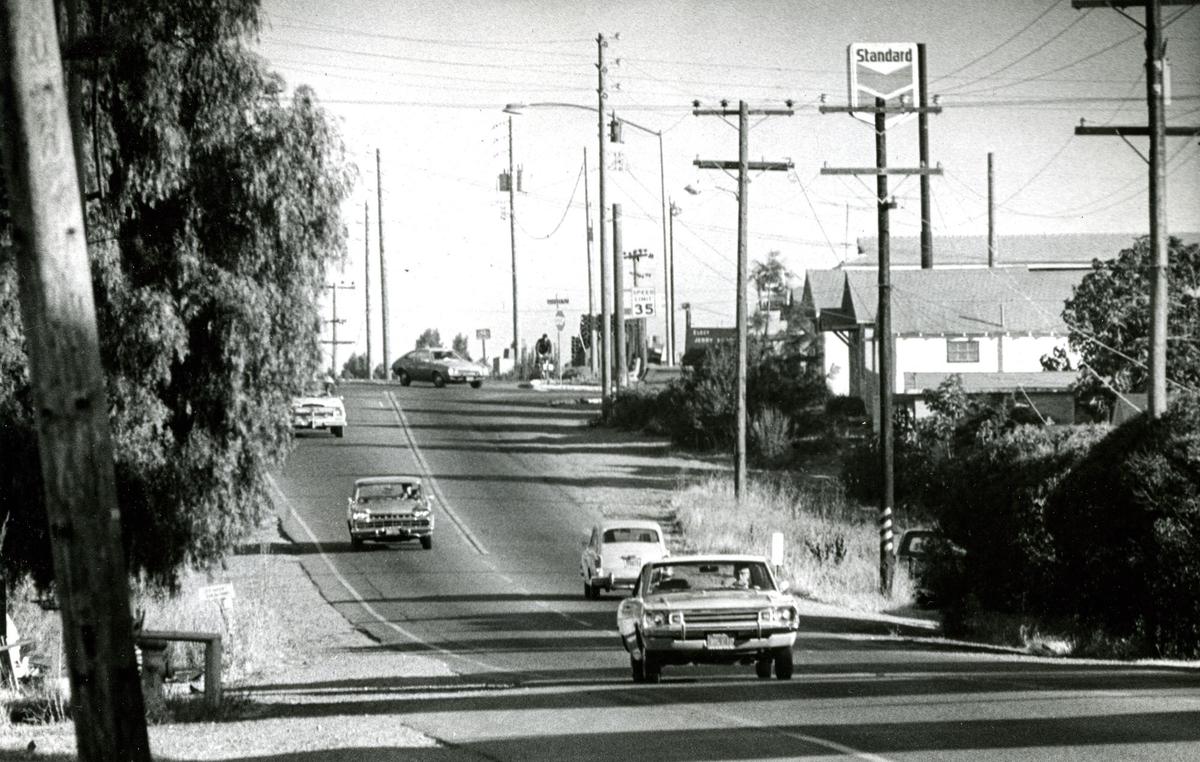 South Broad Street, with its phone lines and curbless sides, is envisioned with a planed median and underground utility lines. Photo is taken from a spot just south of Orcutt Road and published August 20, 1974.