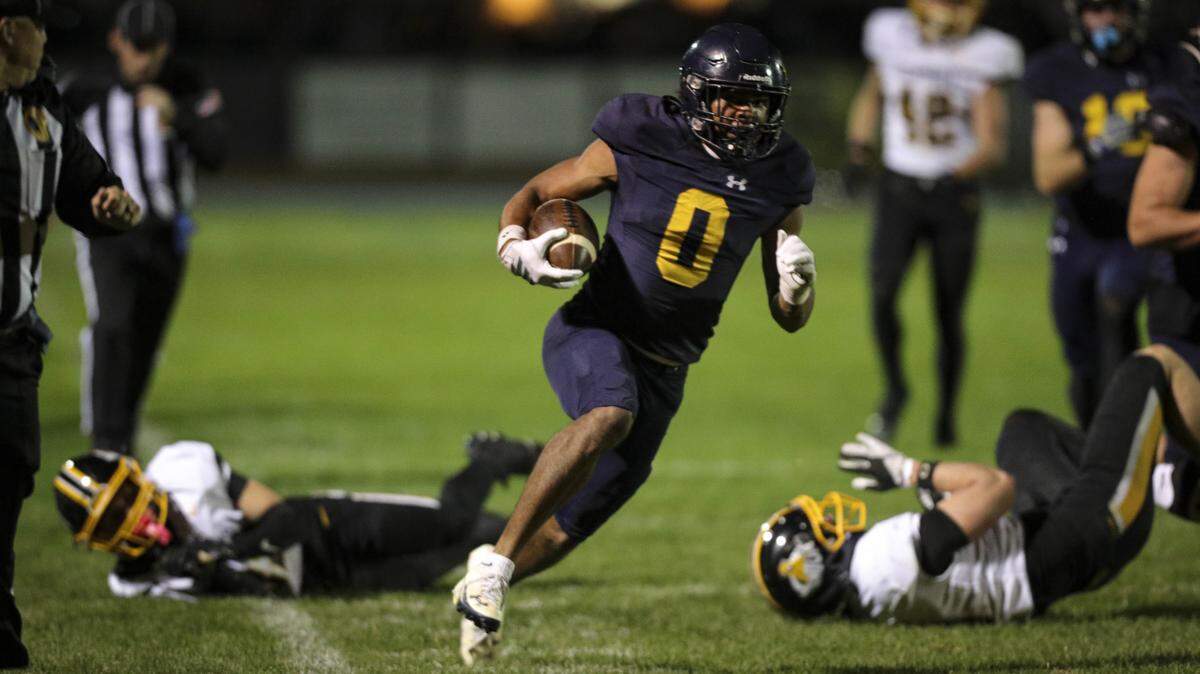 Caleb Clark on his way to the second Arroyo Grande touchdown. He followed it with a two point conversion run. Ventura beat Arroyo Grande 35-28 in a high school state football championship semi-final on Dec. 5, 2025.