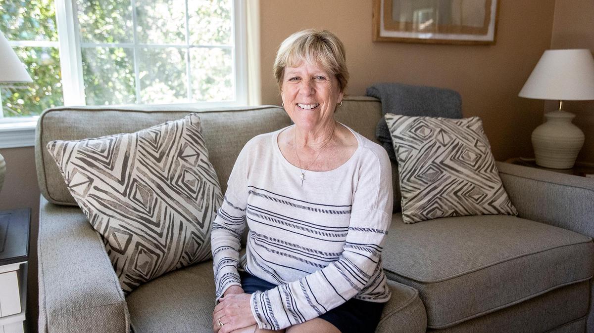 Former Pismo City Councimember Shelly Higgenbotham in the living room area of her AirBnB unit.