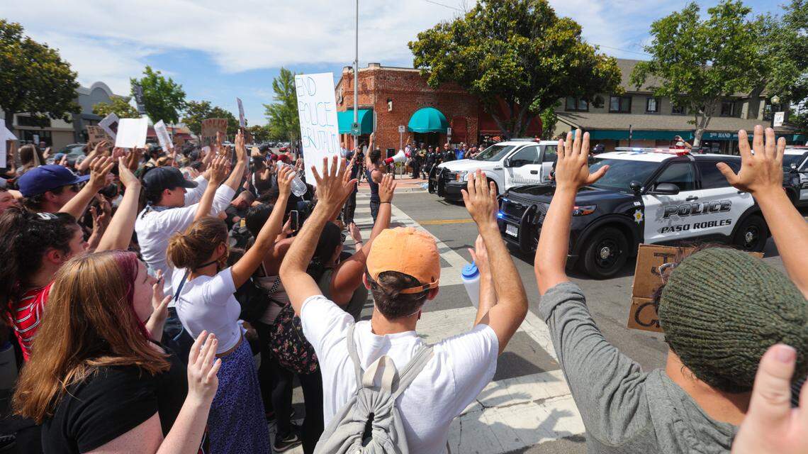 About 100 protesters marched in Paso Robles during a Black Lives Matter protest on June 2, 2020. Here, they face Paso Robles police, chanting “Hands up, don’t shoot.”