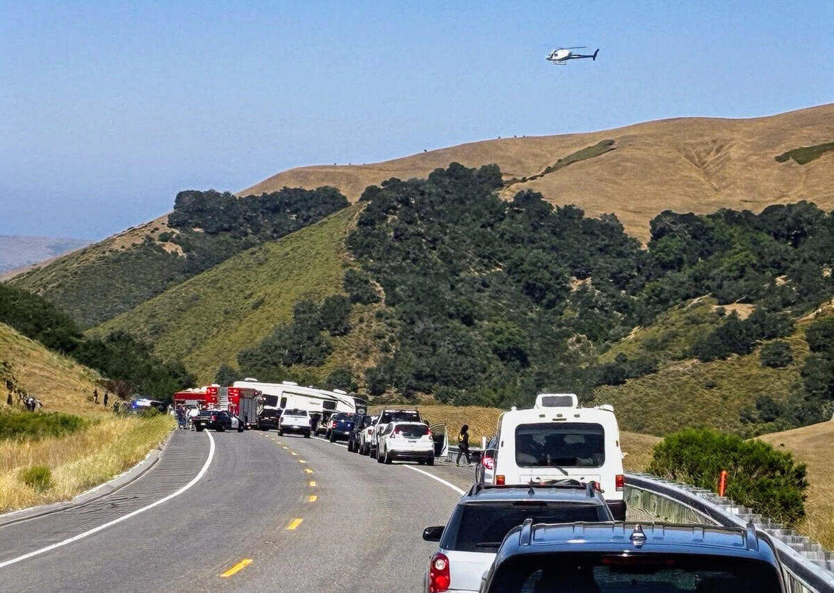 Emergency crews respond to a head-on crash involving a pickup truck towing a fifth-wheel trailer and a Ford Mustang on Highway 46 west of Paso Robles on Sunday, June 7, 2026. The crash prompted a highway closure and SigAlert, according to CHP traffic logs.