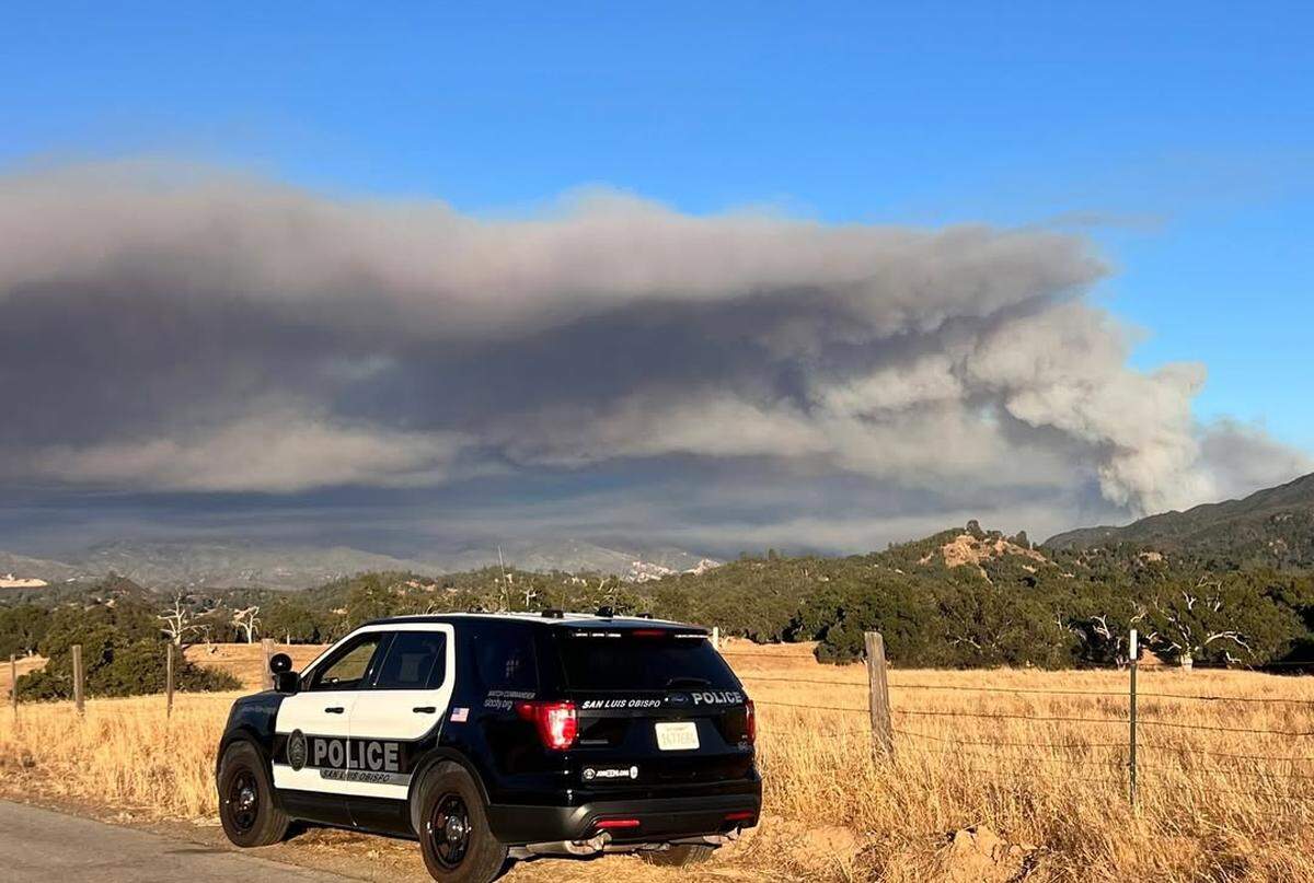 A San Luis Obispo police unit provides traffic control duty for the Gifford Fire on West Pozo Road on Aug. 9, 2025.