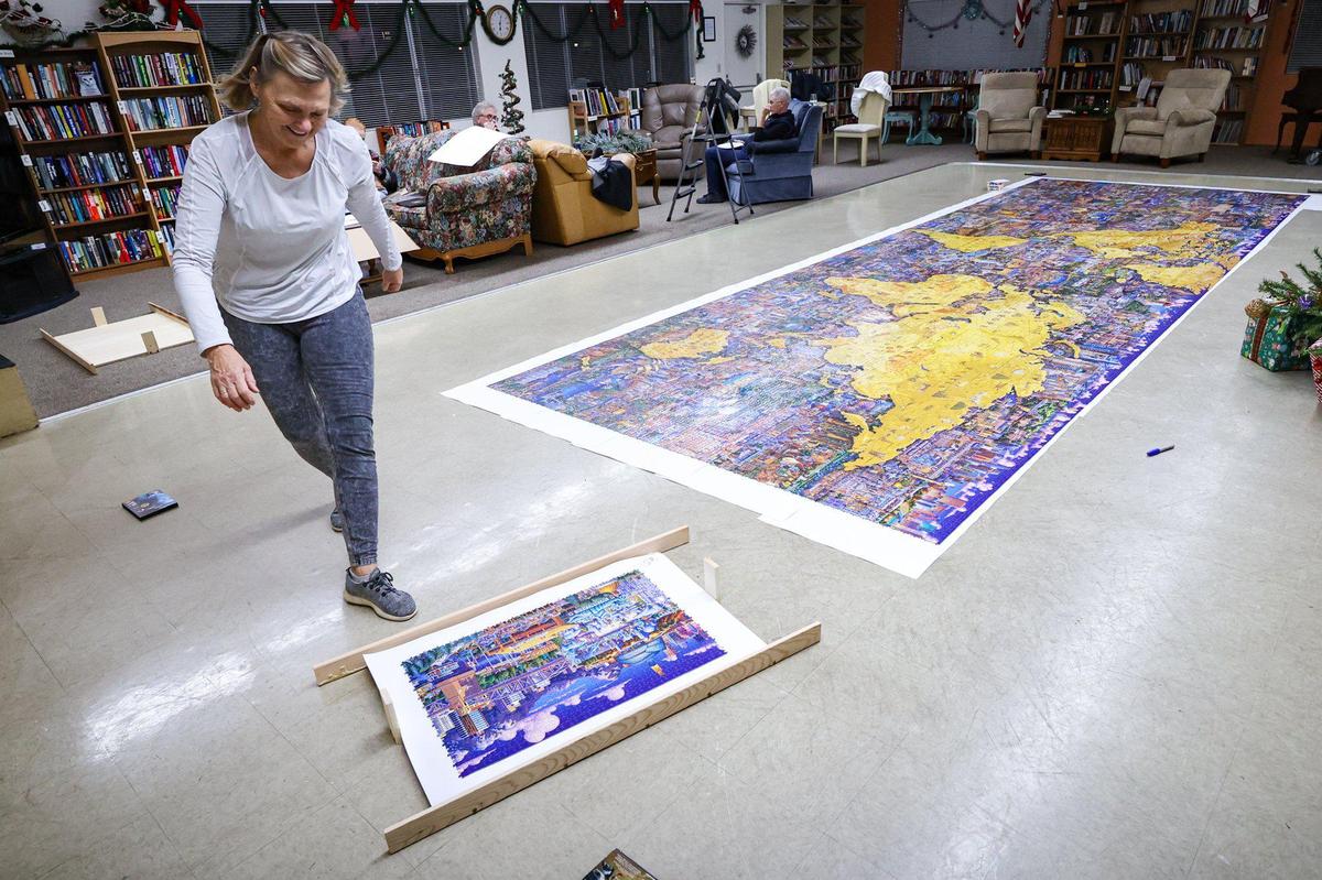 Dr. Minke WinklerPrins completed a 60,000 piece puzzle larger than a garage door. With help from friends 60 - 1,000 piece sections were assembled Dec. 29, 2022. She started the puzzle at the beginning of November when it was released.