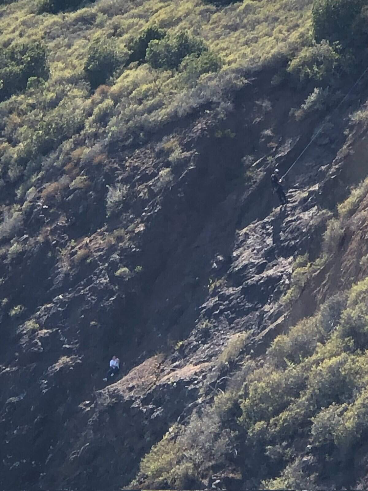 A climber near the Pecho Coast Trail gets rescued by first responders on Saturday, April 23, 2022.