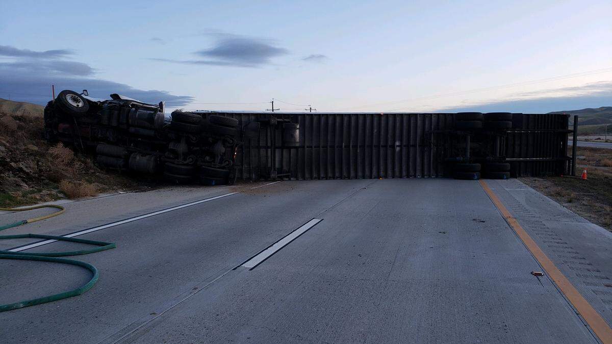 An overturned semi-truck blocked westbound lanes of Highway 46 on Sunday morning.