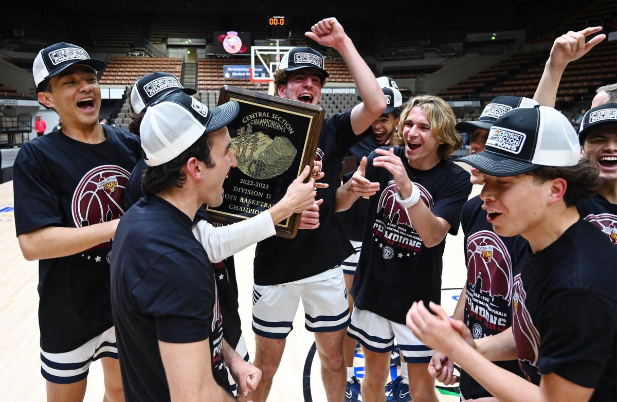 Arroyo Grande celebrates its 59-30 win over Porterville at the CIF Central Section Boys D-II basketball championship Friday, Feb. 24, 2023, in Fresno.