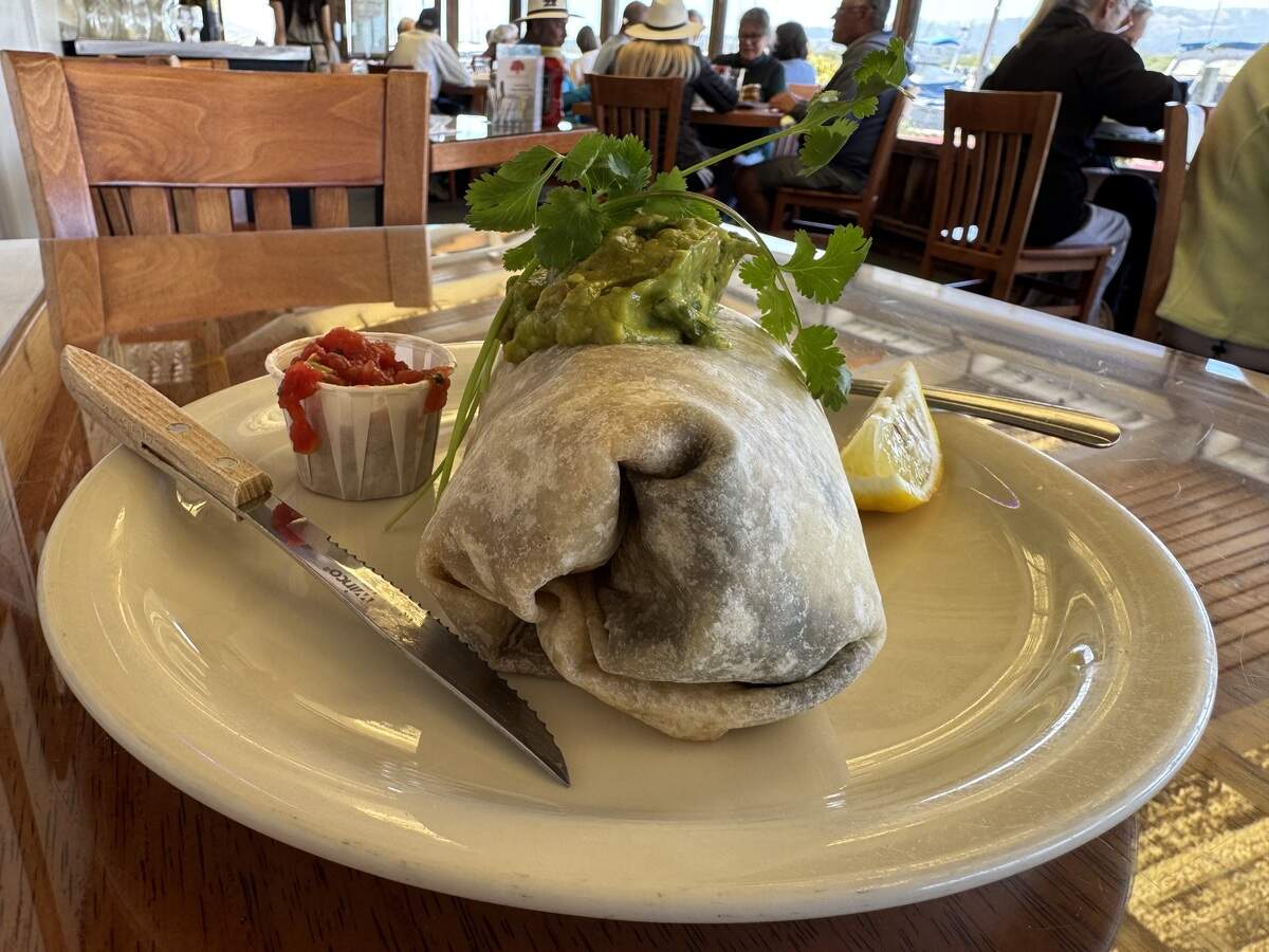 The fish burrito at Bayside Cafe comes with wild Alaskan cod, black or pinto beans, onions, jack cheese and cabbage in a flour tortilla.