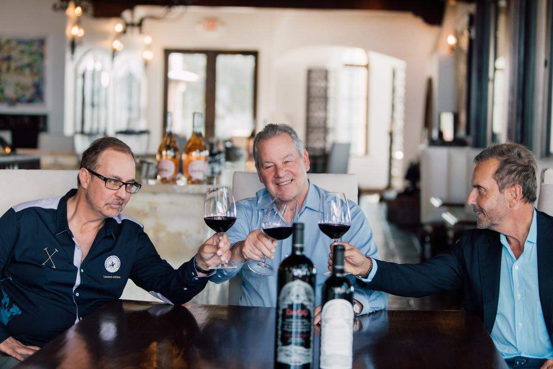 Master Sommelier Fred Dame, center, celebrates joining Daou Vineyards and Winery in Paso Robles as global wine ambassador with winery founders Daniel and Georges Daou in 2018.