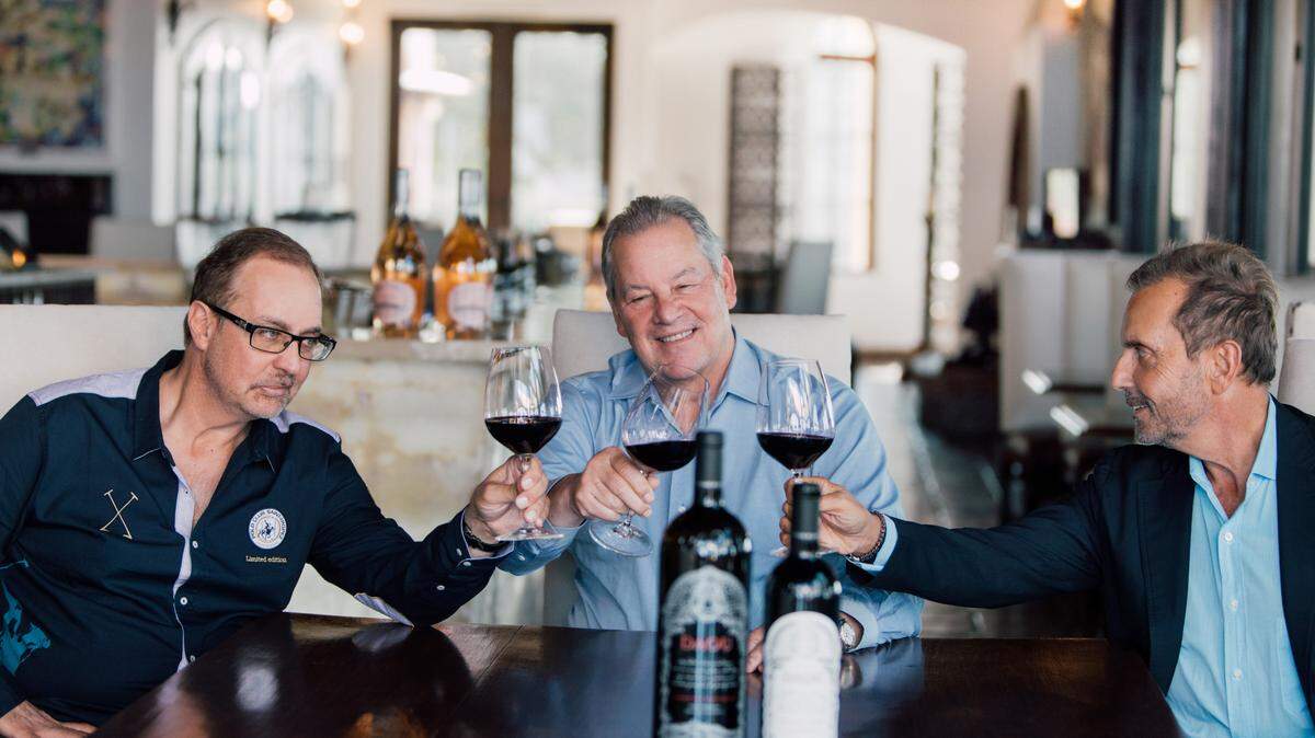Master Sommelier Fred Dame, center, celebrates joining Daou Vineyards and Winery in Paso Robles as global wine ambassador with winery founders Daniel and Georges Daou.