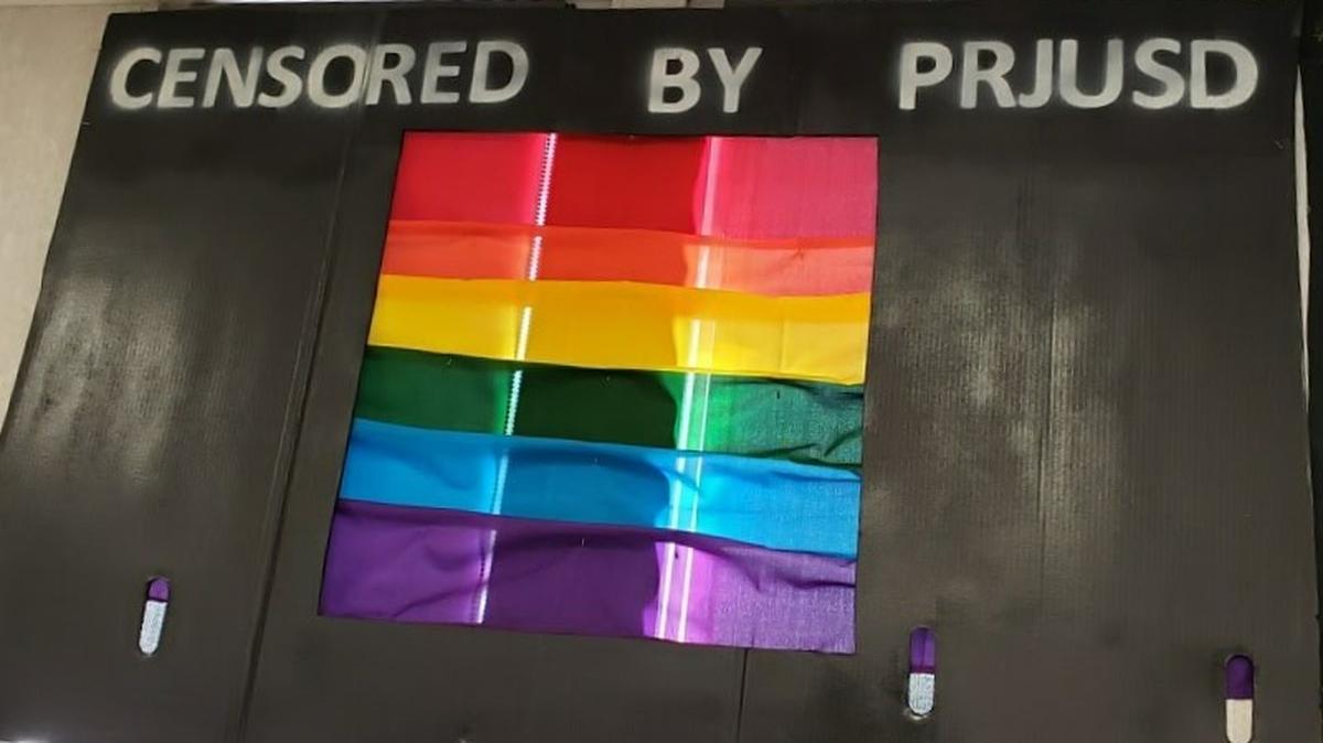 A sign hangs up at Paso Robles High School in protest of the North County school district’s new flag policy, which followed an incident in which a LGBTQ Pride flag was stolen from a classroom and defecated on in a toilet.