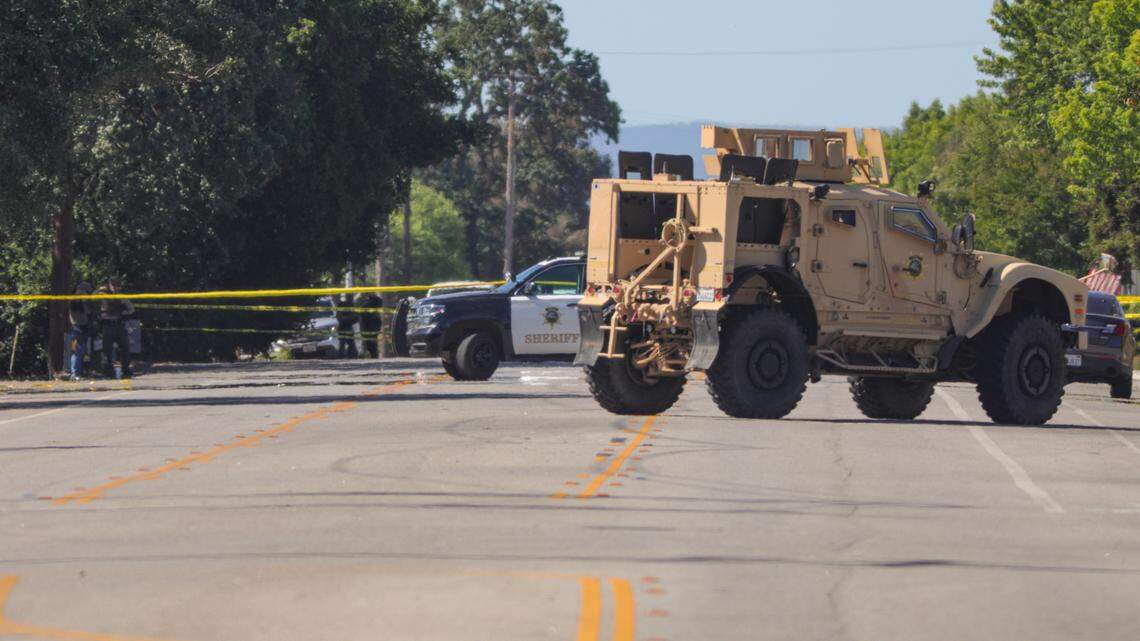 A tactical vehicle is parked near 12th and Riverside Ave. Riverside Ave. in Paso Robles is closed at 13th street. downtown Paso Robles is closed as police investigate an early morning shooting June 10, 2020.