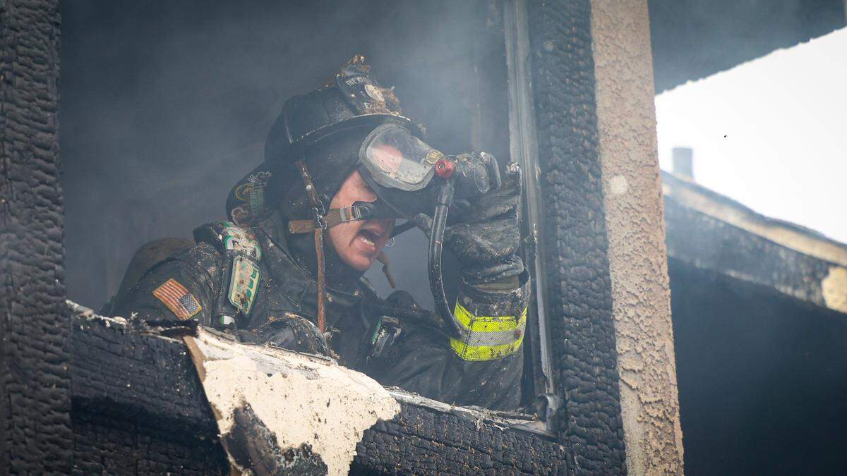 A firefighter battles a two-alarm blaze that damaged two floors of a home on the 1500 block of 22nd Street in Oceano on Monday, Feb 27, 2023. Five Cities Authority, Cal Fire and the Santa Maria Fire Department were among the agencies that responded to the scene.