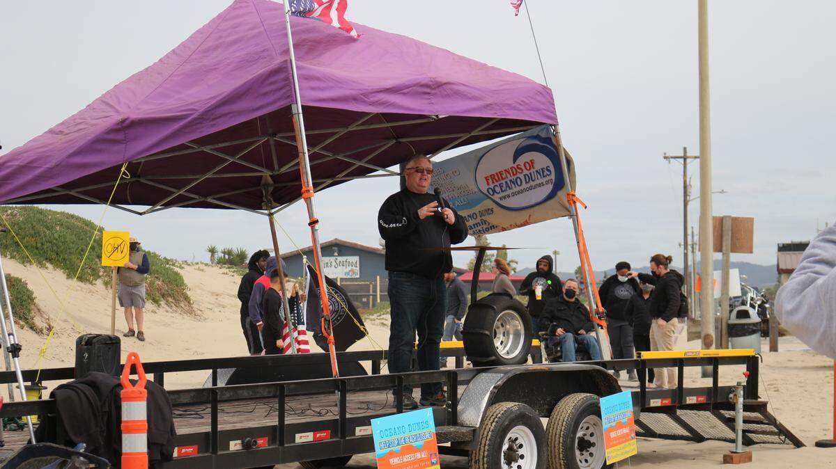 Jim Suty, president of Friends of Oceano Dunes, speaks at a protest Sunday, March 14, 2021, to demand the California Coastal Commission allow continued off-highway vehicle use at the Oceano Dunes SVRA. The protest was co-sponsored by the Pismo Beach Chamber of Commerce and local OHV-advocacy group Beach.Drive.Ride.