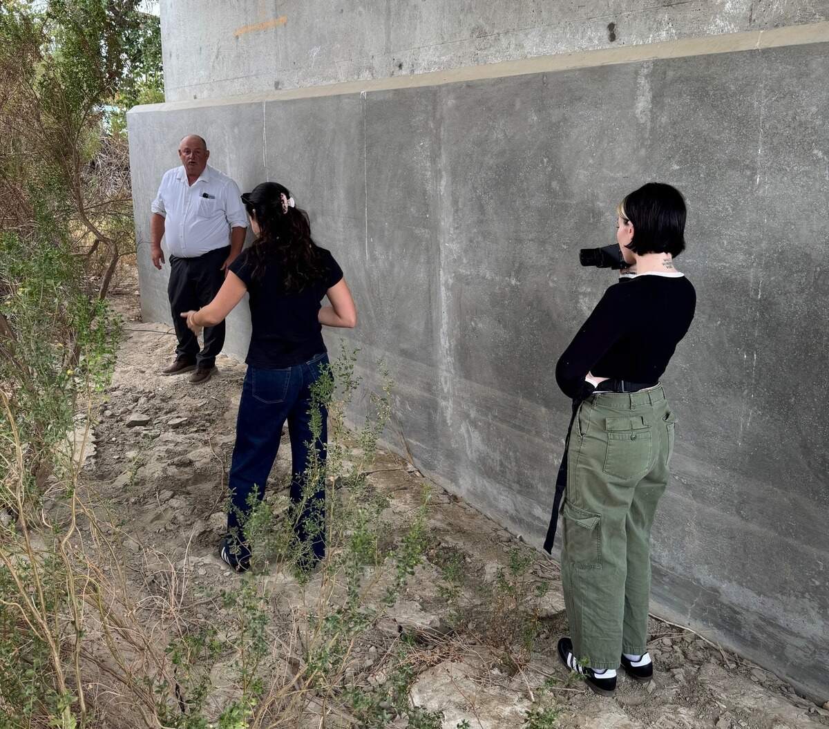 San Luis Obispo County Sheriff’s Office Detective Clint Cole shows “Crime Junkie” podcast hosts crime scenes of the 1980 cold case double murder of 4-year-old Martha Mezo and 5-year-old Teresa Flores. A Nov. 10, 2025, episode of the podcast reports on the reopened investigation, led by Cole.