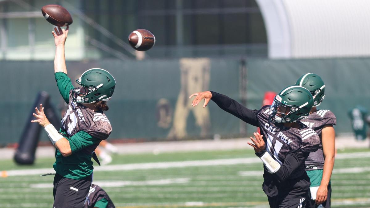 Spencer Brasch (13) and Jaden Jones (11) are competing for the starting quarterback job as Cal Poly prepares for it’s season opener.