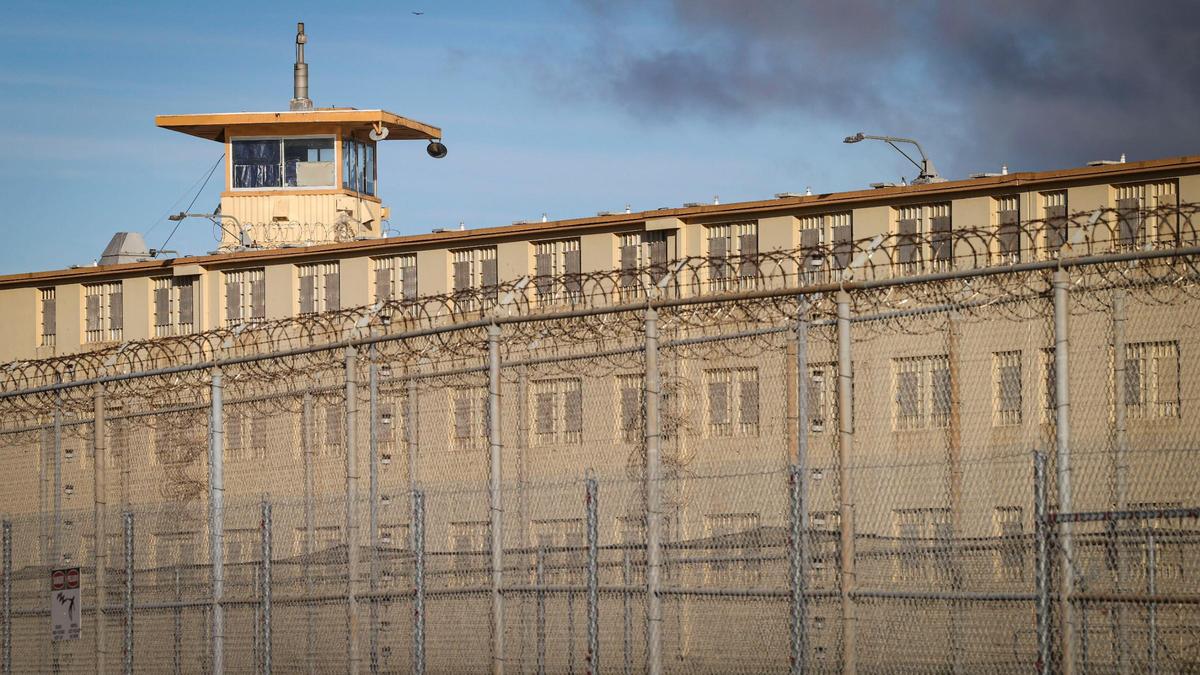 Electrified fence and a taller, outer perimeter topped by razor wire surround the California Men’s Colony prison in San Luis Obispo on Nov. 12, 2024.