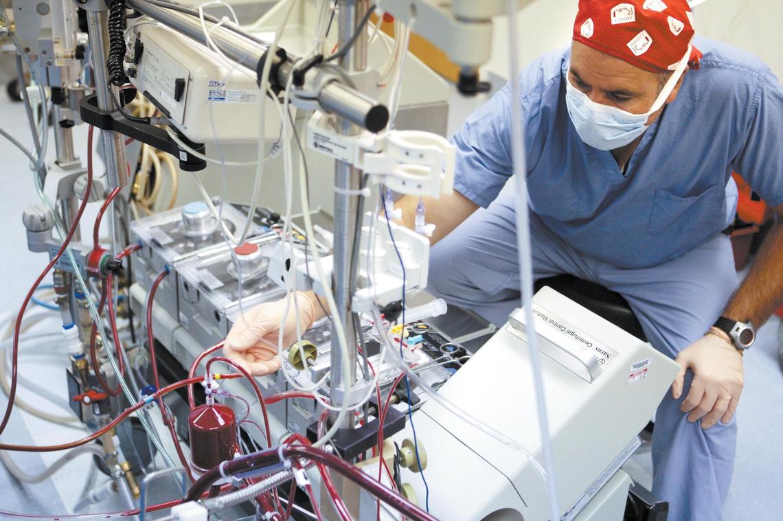 Perfusionist Mike Daily monitors the heart-lung machine during heart bypass surgery at French Hospital Medical Center in San Luis Obispo on June 25, 2008.