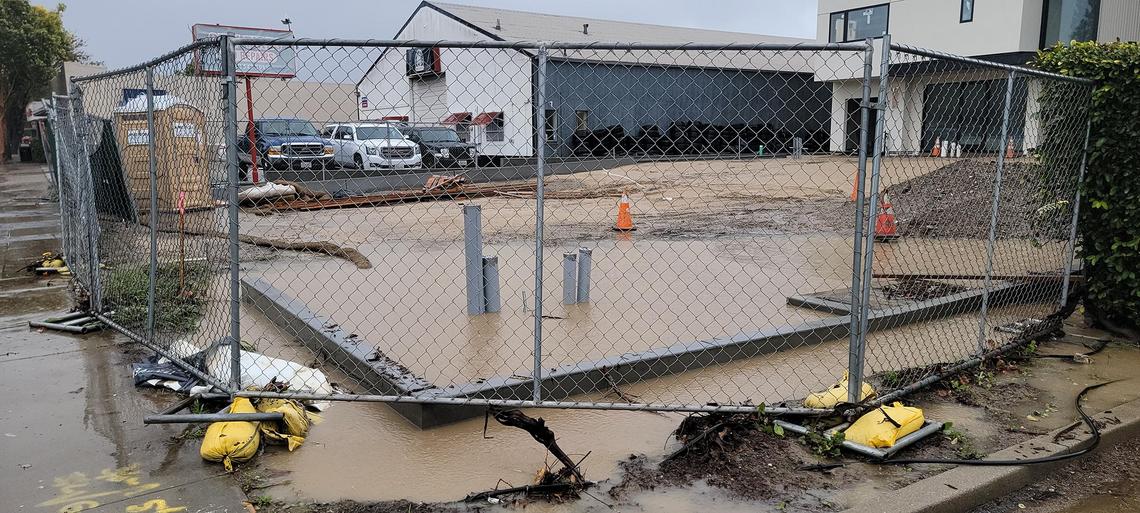 Business along South Higuera Street at South Street in San Luis Obispo were hit with flood water, mud and debris.
