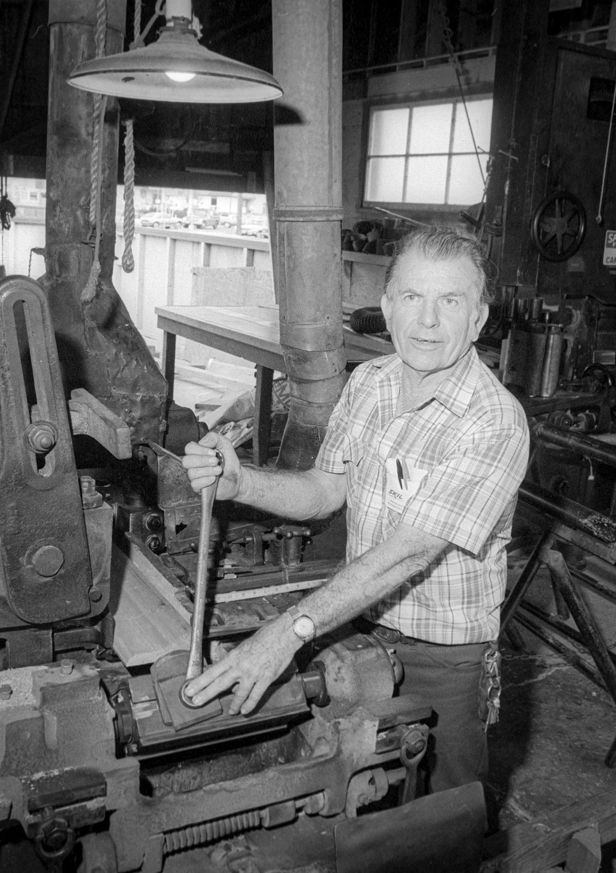 Port San Luis Harbor board member Gerard Parsons at his San Luis Mill and Lumber shop in this photo from Jan. 30, 1984. He served as Port San Luis Harbor Commissioner for 31 years. He and brother, Roy, owned the lumber yard.