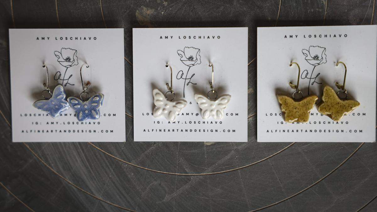 Amy Loschiavo is making butterfly earrings seen here on Dec. 4, 2025. A portion of the proceeds will go to helping threatened monarch butterflies.