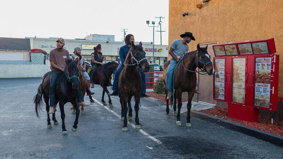 "Compton Cowboys" pick up some friend chicken.