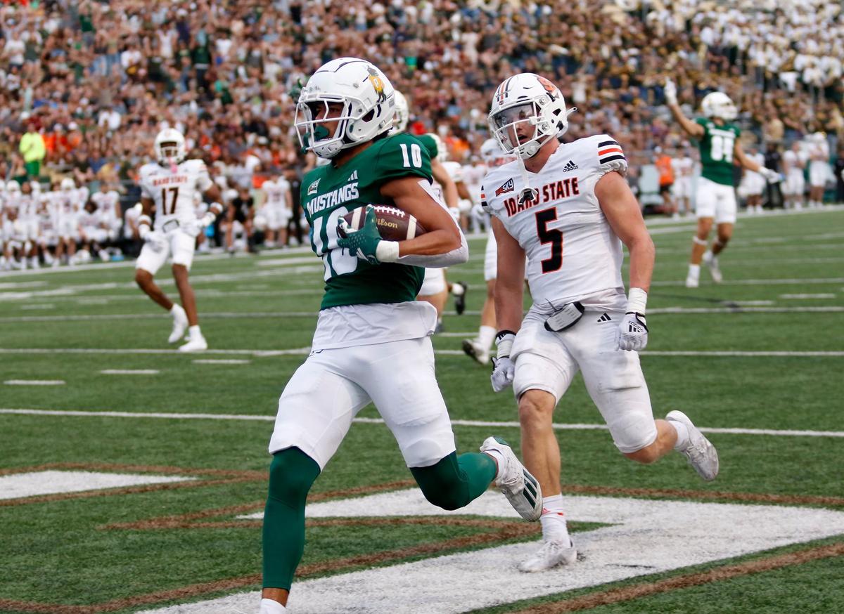 Wide receiver Michael Briscoe takes the football all the way to the end zone for a touchdown. The Bengals’ Jayden Bell couldn’t catch him. Cal Poly lost to Idaho State 41-38 in a college football game at Mustang Memorial Stadium on Oct. 5, 2024
