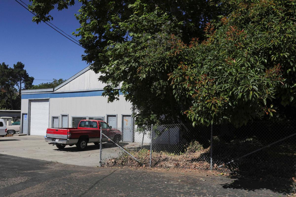 The city will demolish a building belonging to CoastRiders Powersports on Higuera Street near the Marsh Street bridge to give the creek more space, which will prevent flooding.