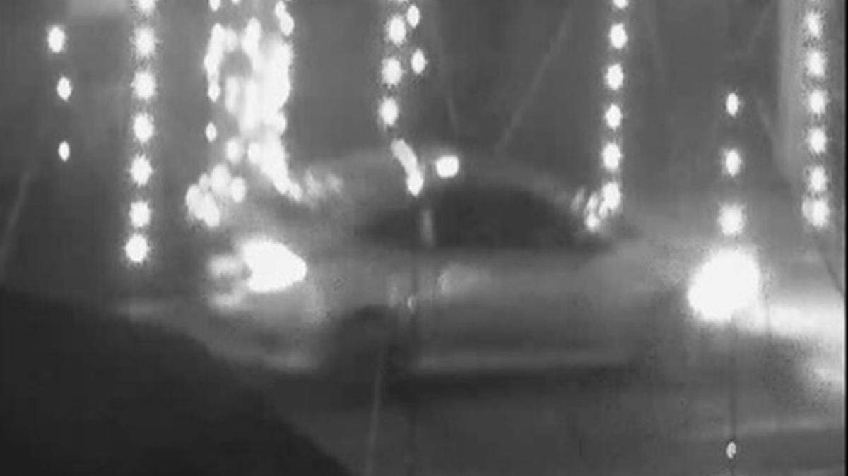 Surveillance video shows a car hitting holiday decorations at Mission Plaza early Friday morning, Dec. 16, 2022.