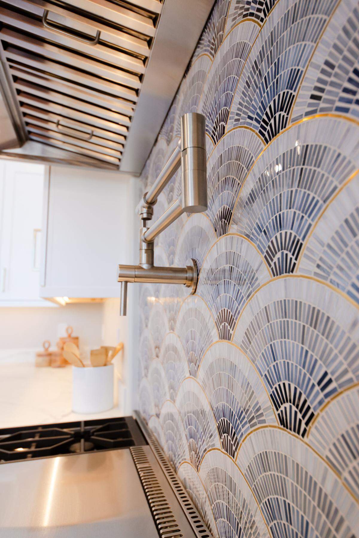 The fan motif backsplash tile influenced color and style choices throughout Jovita and Alex Honor’s Arroyo Grande house.
