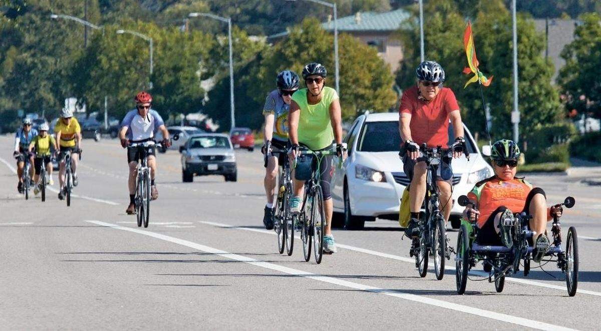Members of the Tortoise group of the SLO Bicycle Club take a ride along Broad Street in San Luis Obispo in a well-marked, dedicated bike lane.