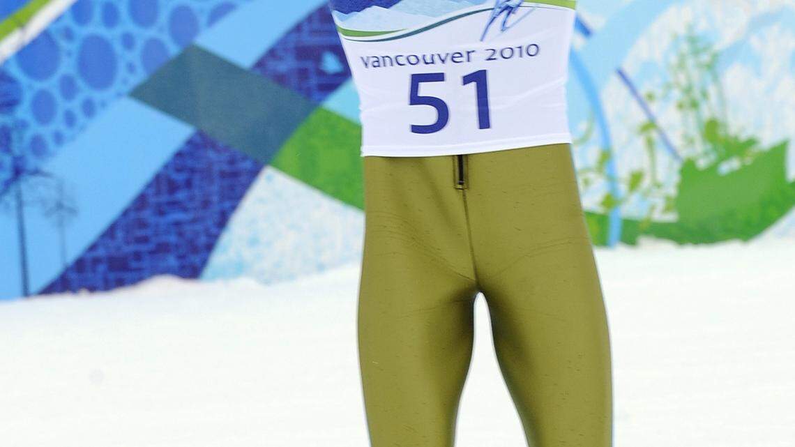 First gold in Vancouver goes to Swiss ski jumper