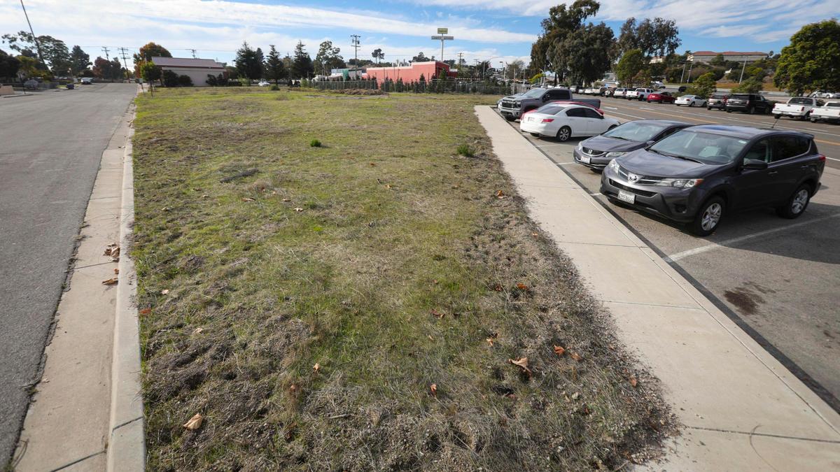 A hotel and carwash are proposed for this lot at the corner of North Halycon and El Camino Real. on Dec. 3, 2023.