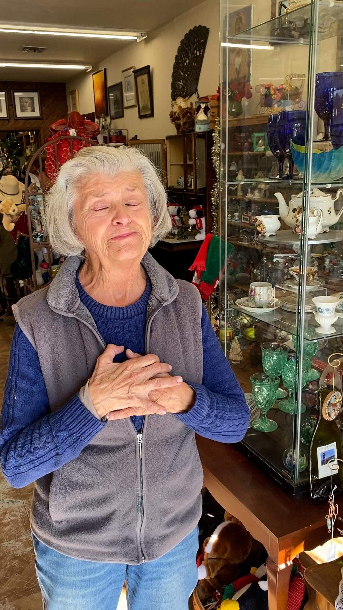 Debbie Dill keeps memories of Rachel Somars close to her heart at the Meade Canine Rescue Resale Shop in Atascadero on Dec. 2, 2025. Somars was hit by a car and killed while walking to the store the day before.
