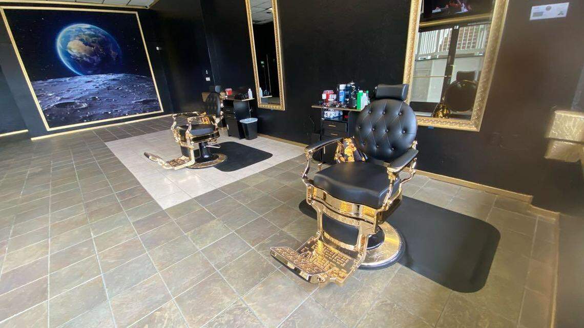 New SLO County barbershop features gilded chairs in a sleek, space-themed setting