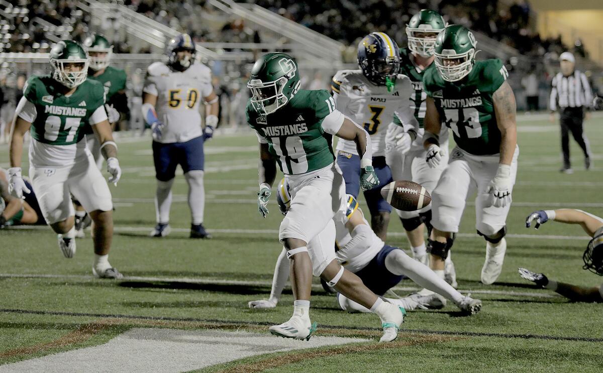 Cal Poly’s Zion Hall scores the first touchdown of the game. Cal Poly lost to Northern Arizona 31–14 in a college football game at Mustang Memorial Field on Nov. 9, 2024.